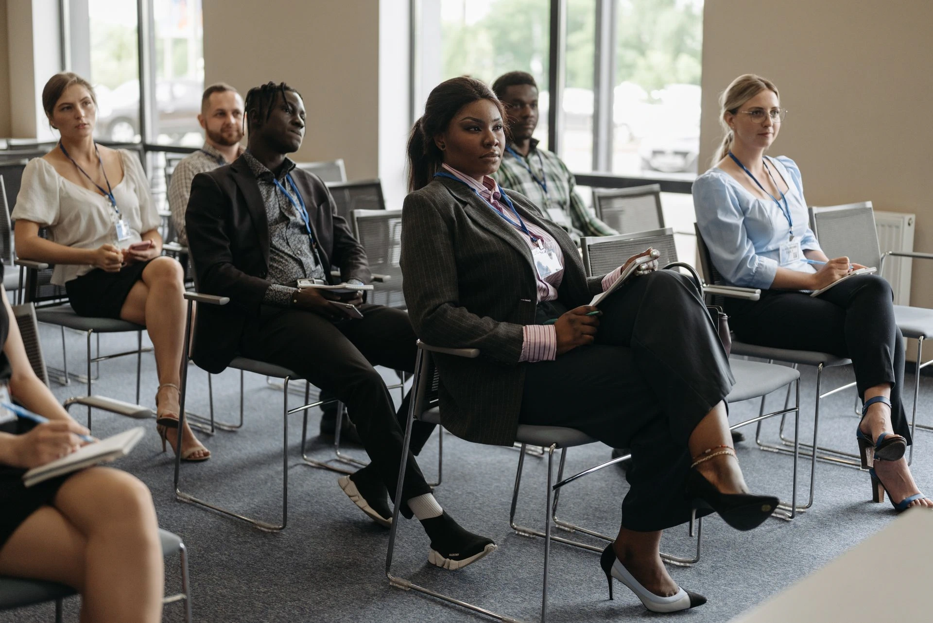 Cadres d'entreprise en formations dans une salle de conférence avec MDR Coaching